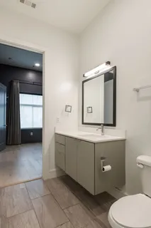 a view of a storage & utility room with a sink