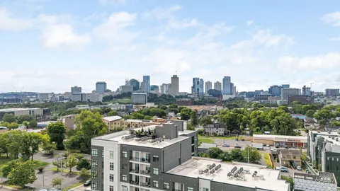 a view of city with tall buildings
