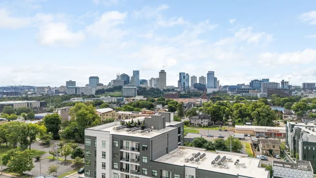a view of city with tall buildings