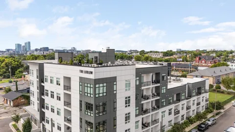 a bathroom with a glass shower door