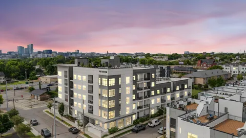 a kitchen with a sink and a refrigerator