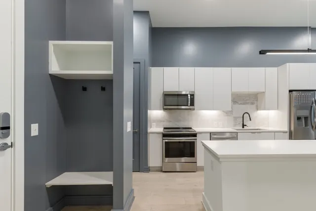 a view of a living room and a large window