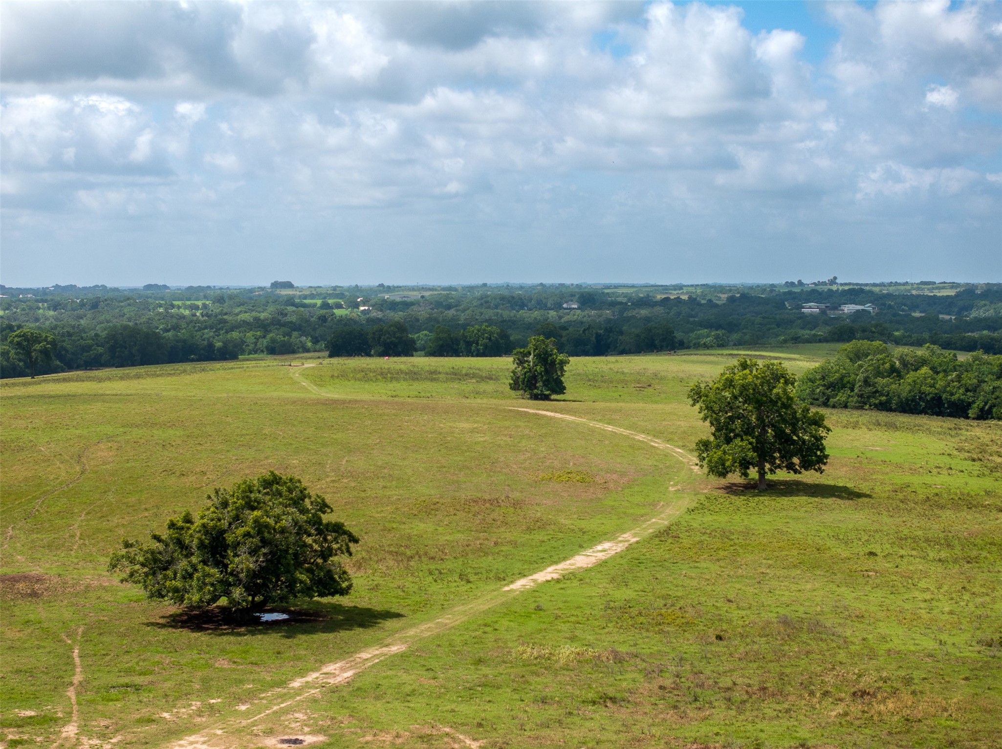 6550 Gibbs Creek Road Chappell Hill, TX 77426 - Photo 28 of 32 a view of an ocean and beach