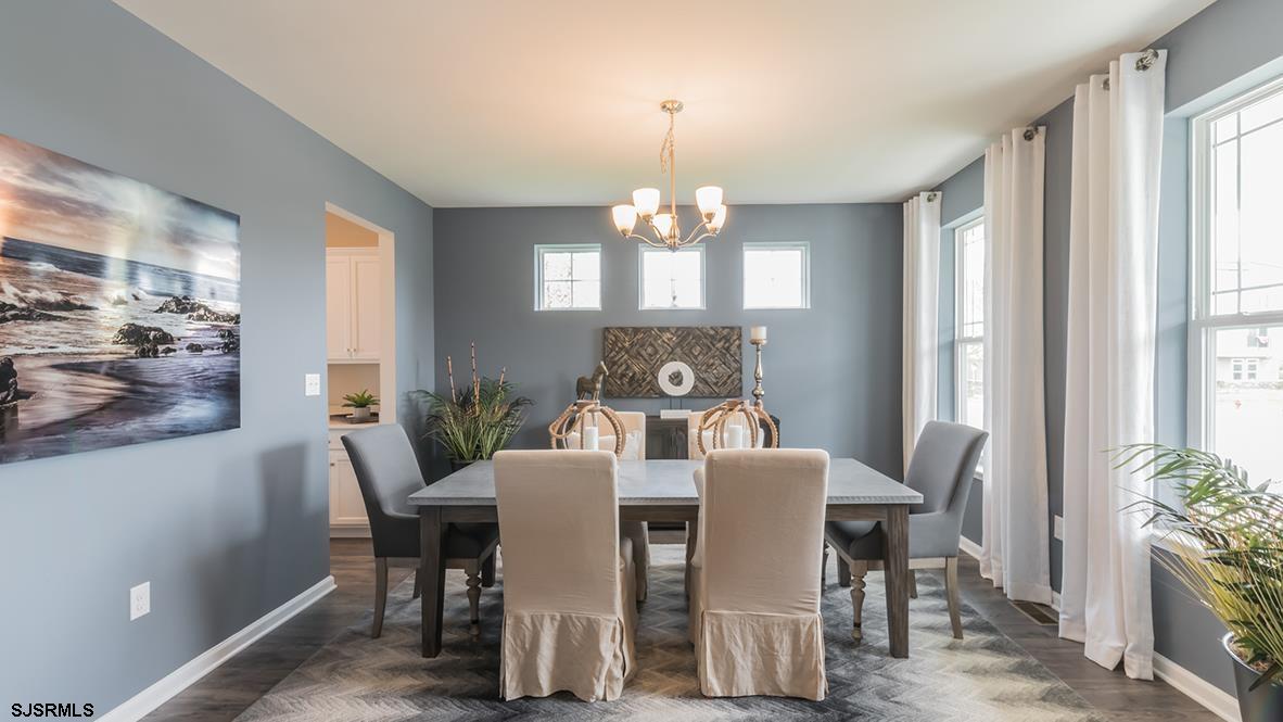 147 Leeds Point Road Galloway Township, NJ 08205 - Photo 4 of 24 a view of a dining room with furniture window and wooden floor