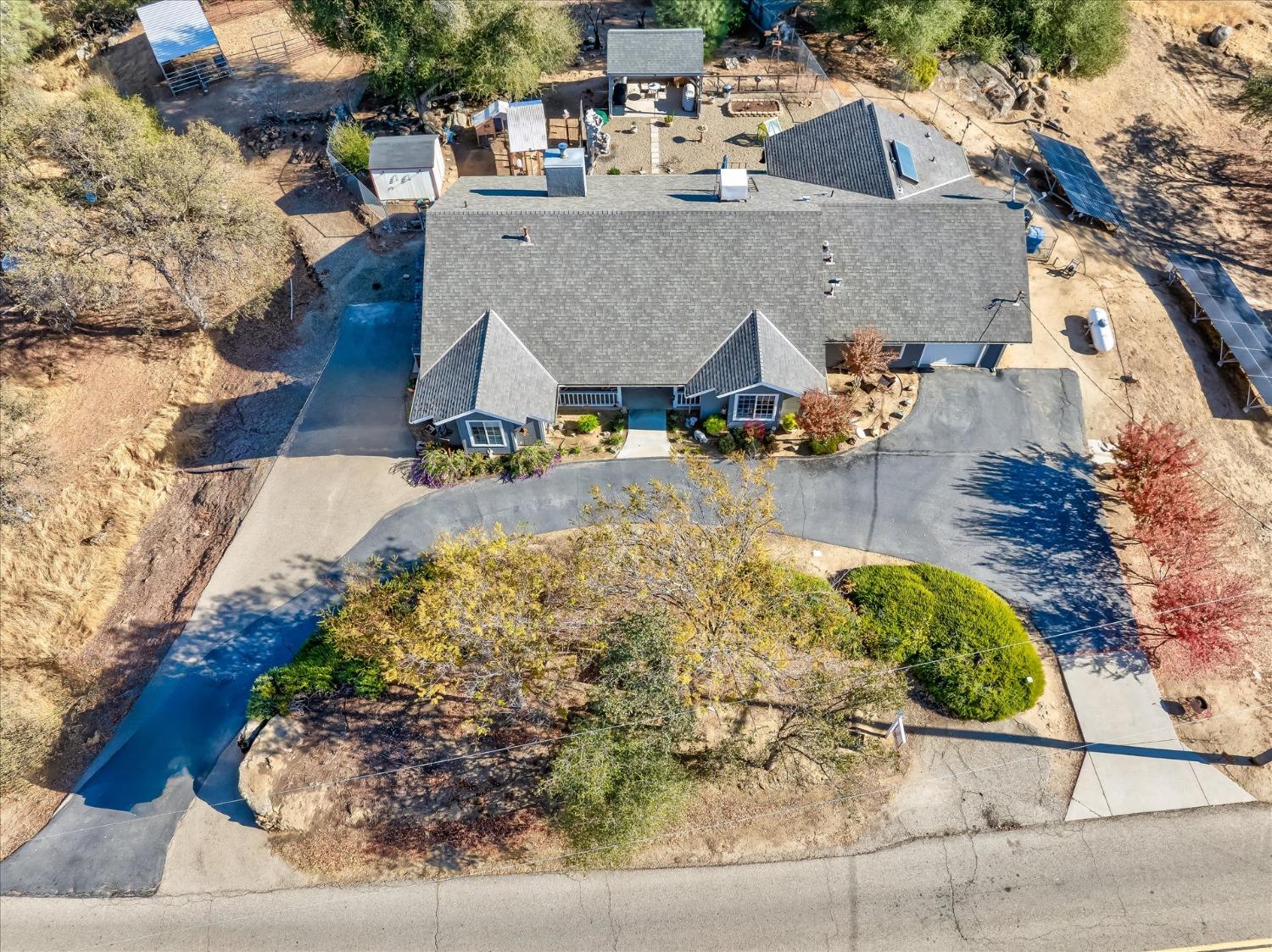 33655 River Knolls Road Coarsegold, CA 93614 - Photo 4 of 55 an aerial view of a house