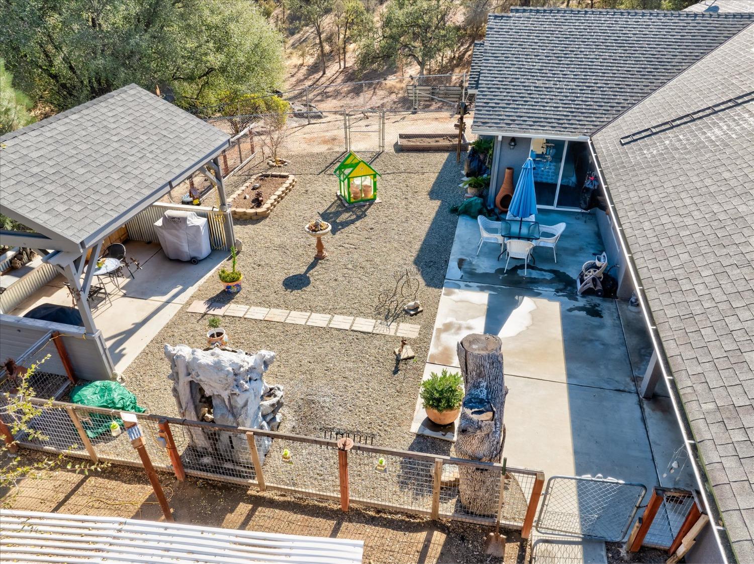33655 River Knolls Road Coarsegold, CA 93614 - Photo 49 of 55 an aerial view of a house having patio