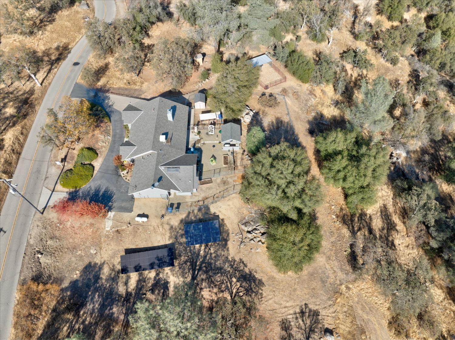 33655 River Knolls Road Coarsegold, CA 93614 - Photo 54 of 55 an aerial view of residential houses with outdoor space