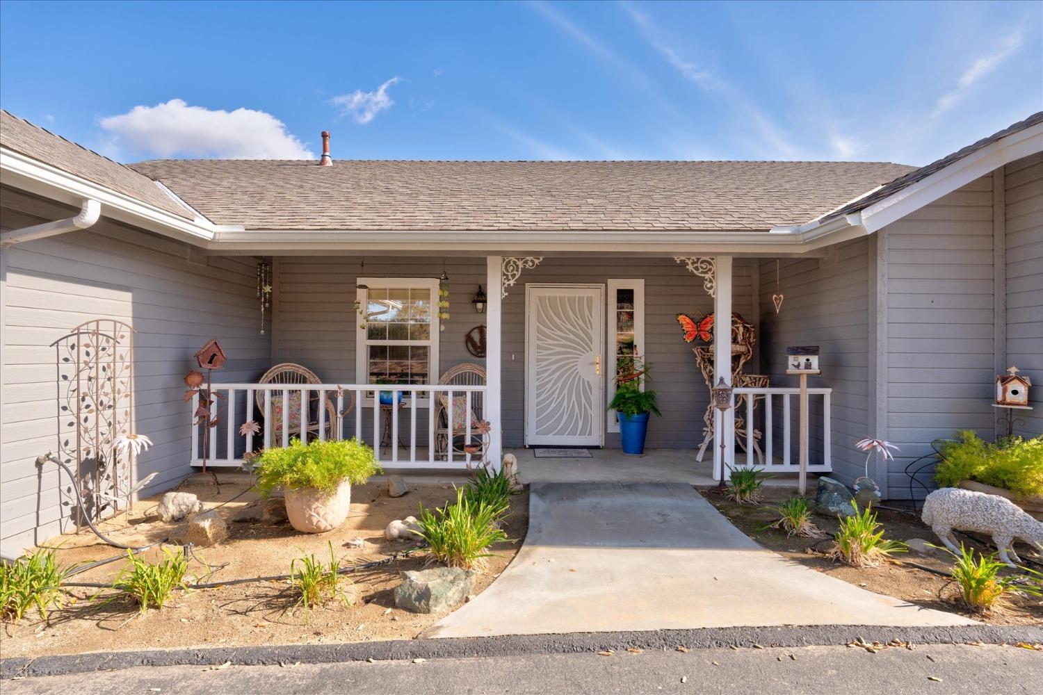 33655 River Knolls Road Coarsegold, CA 93614 - Photo 6 of 55 a front view of a house