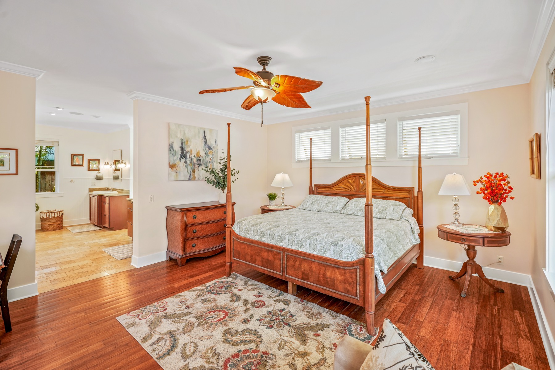 1730 Keleka Road Koloa, HI 96756 - Photo 15 of 29 a bedroom with a bed and wooden floor