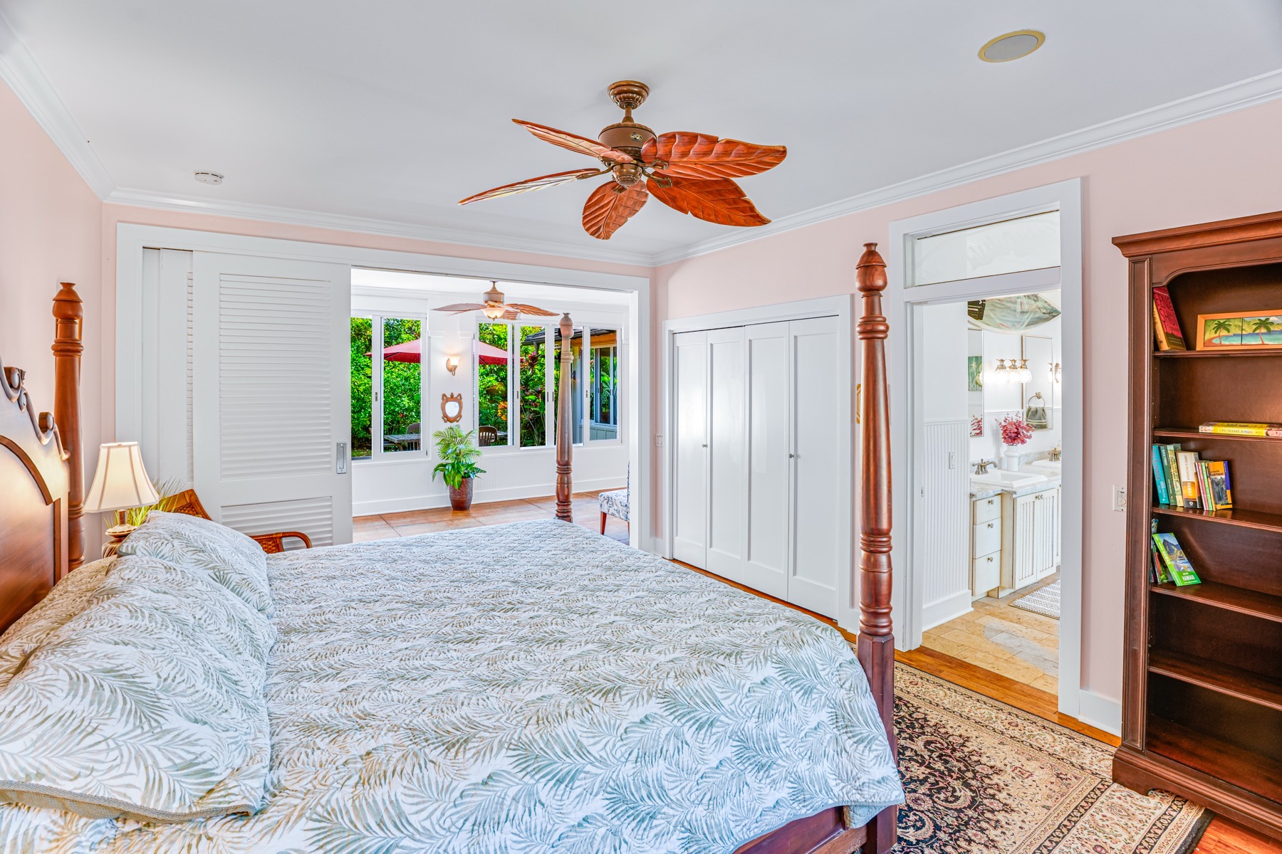 1730 Keleka Road Koloa, HI 96756 - Photo 18 of 29 a bedroom with a bed and a large window