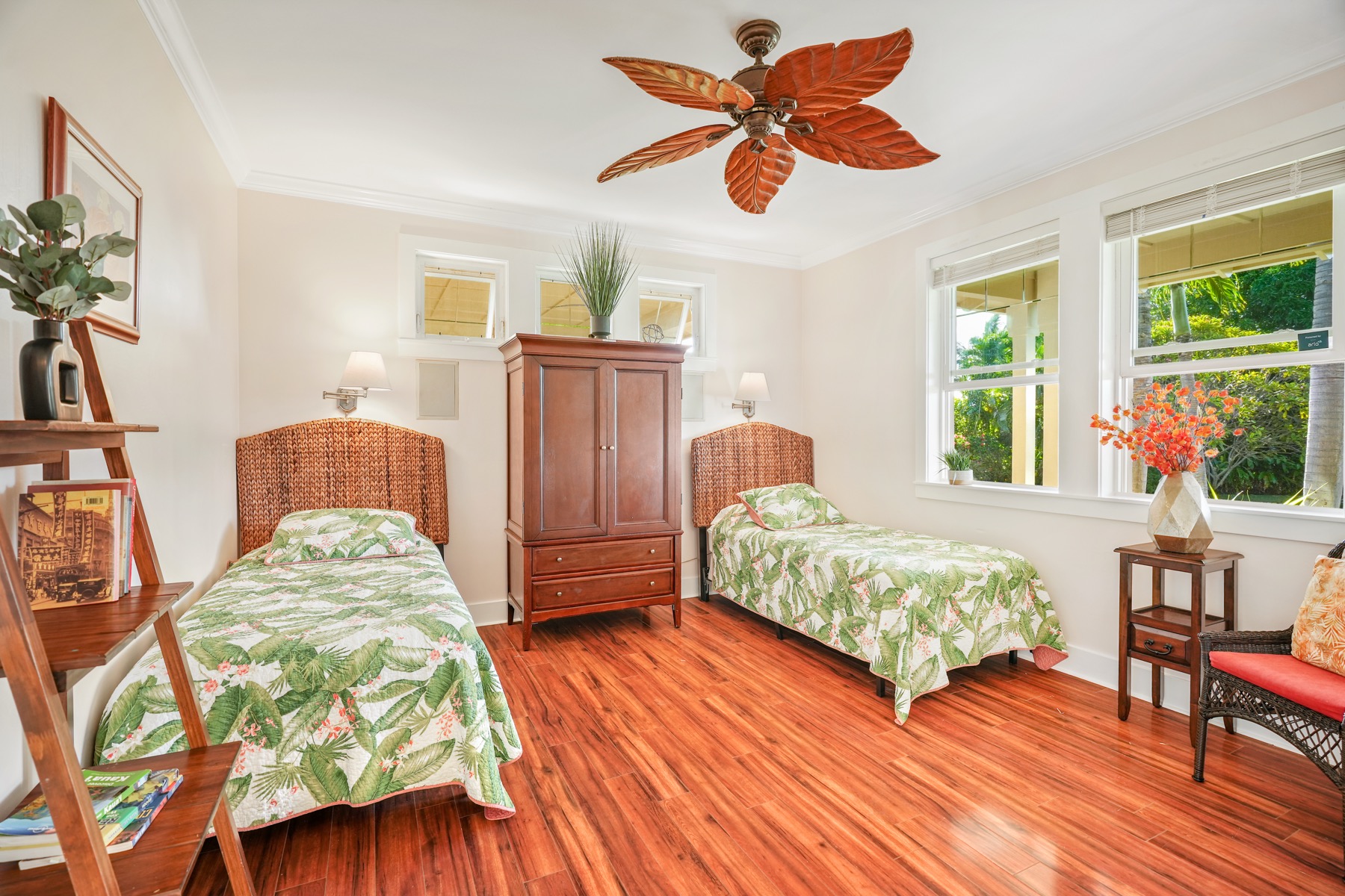 1730 Keleka Road Koloa, HI 96756 - Photo 20 of 29 a bedroom with a bed and wooden floor