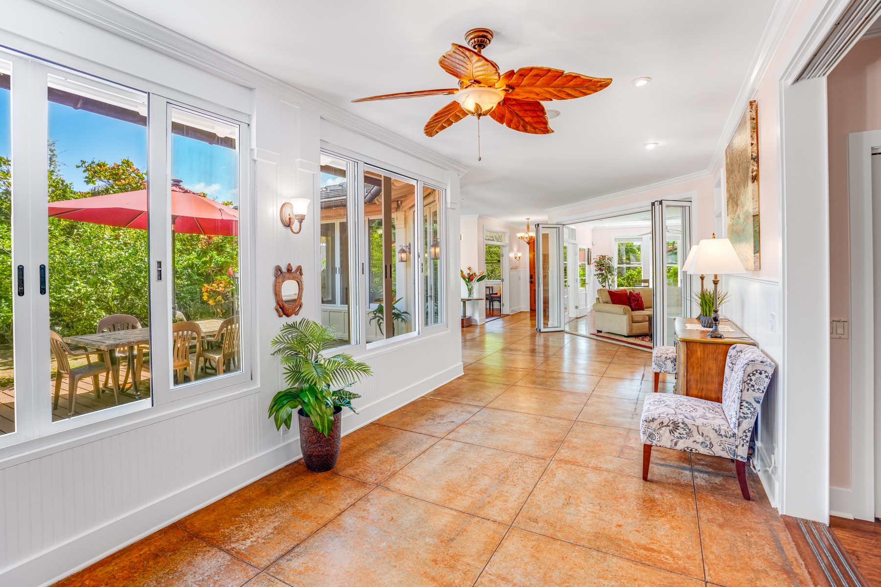 1730 Keleka Road Koloa, HI 96756 - Photo 2 of 29 a lobby with furniture and floor to ceiling window