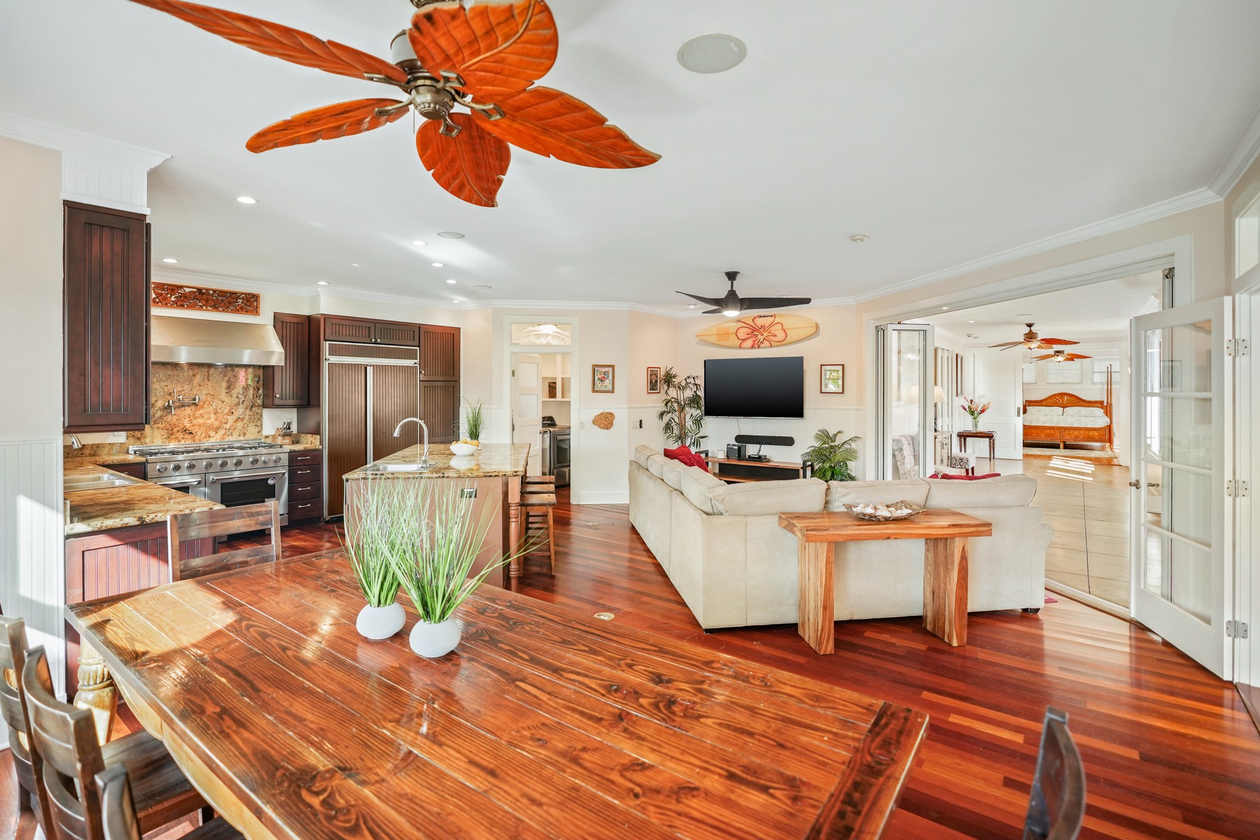 1730 Keleka Road Koloa, HI 96756 - Photo 3 of 29 a living room with patio furniture and a flat screen tv