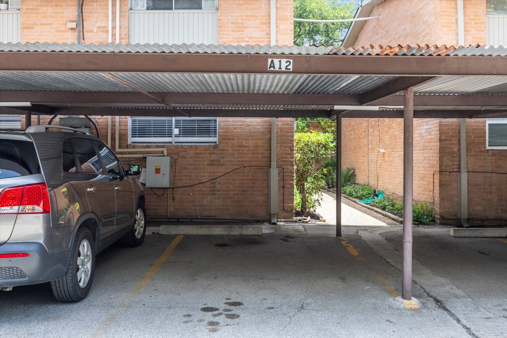 3944 West Alabama Street, Unit 12 Houston, TX 77027 - Photo 20 of 21 a view of parking area