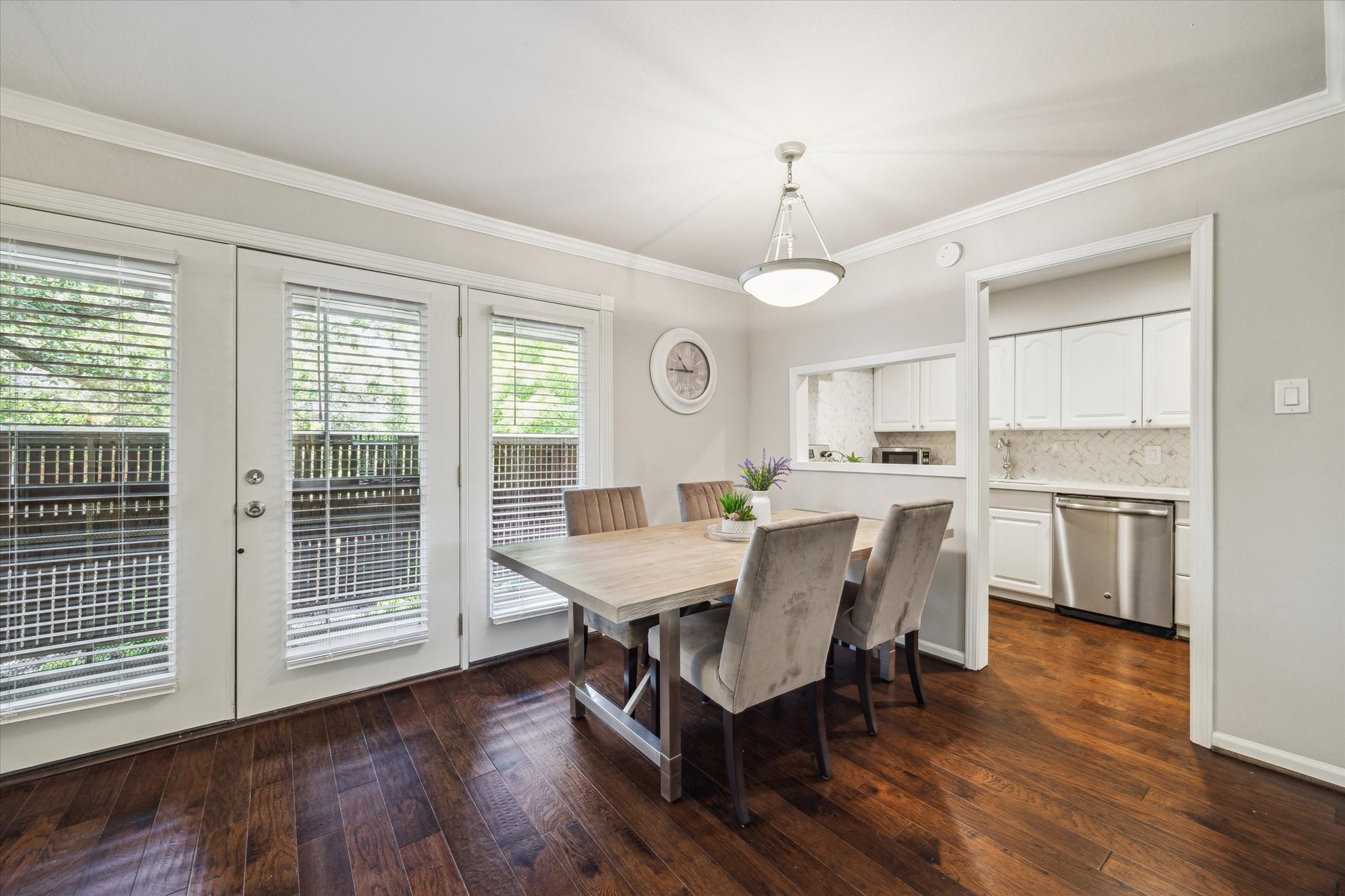 3944 West Alabama Street, Unit 12 Houston, TX 77027 - Photo 2 of 21 a view of a dining room with furniture window and wooden floor