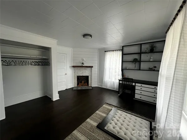 a kitchen with granite countertop a stove and a sink