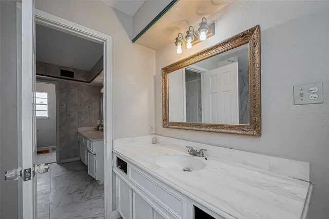 a bathroom with a shower and a toilet