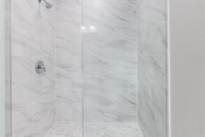 1539 Maux Drive Houston, TX 77043 - Photo 14 of 20 a bathroom with a shower