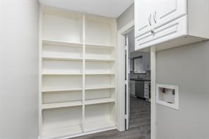 1539 Maux Drive Houston, TX 77043 - Photo 18 of 20 a view of a room with shelves