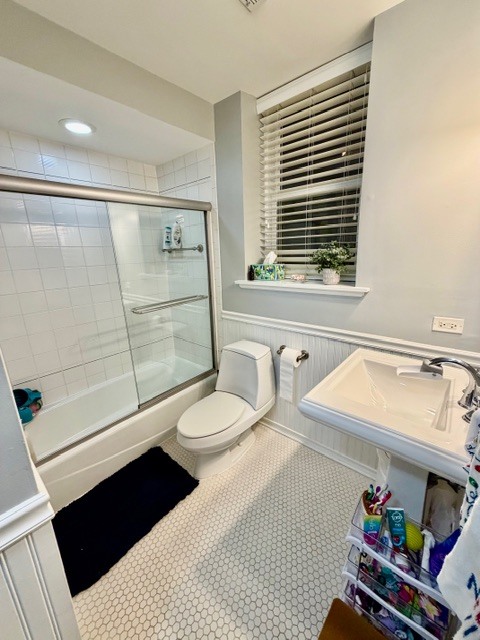 Undisclosed Address Chicago, IL 60614 - Photo 17 of 18 a bathroom with a sink a toilet and shower