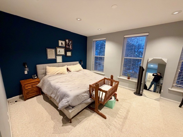 Undisclosed Address Chicago, IL 60614 - Photo 7 of 18 a bedroom with bed and a chair