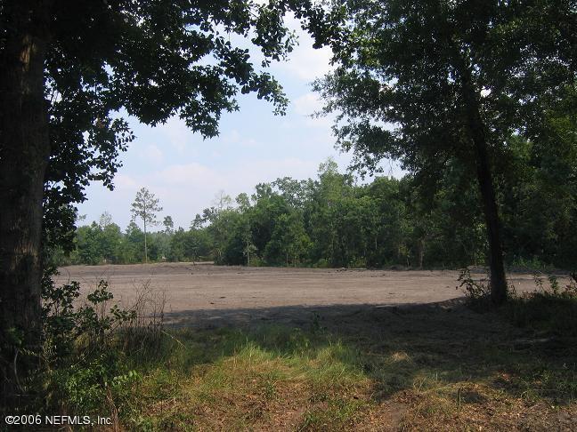 1351 Roberts Road Fruit Cove, FL 32259 - Photo 1 of 5 a view of a lake
