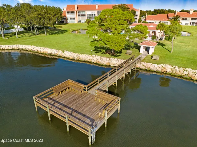 a view of a swimming pool with a lake view