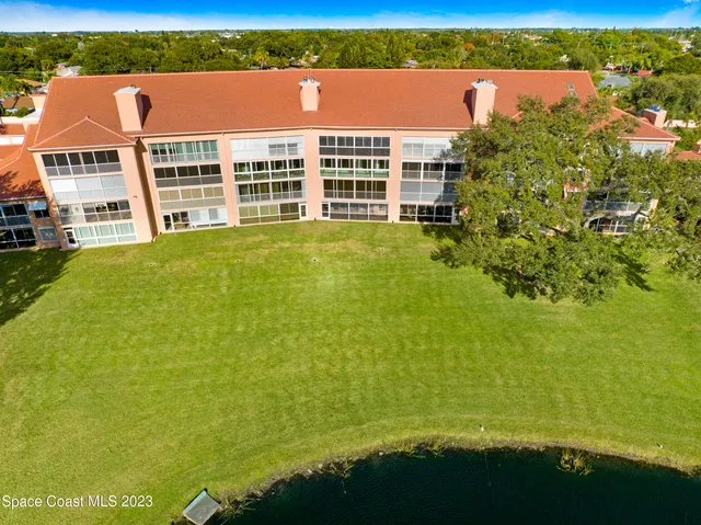 a view of a lake with a building in the background