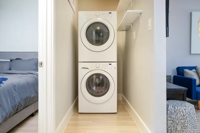 swimming pool view with a seating space