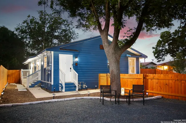a view of a chairs in front of house