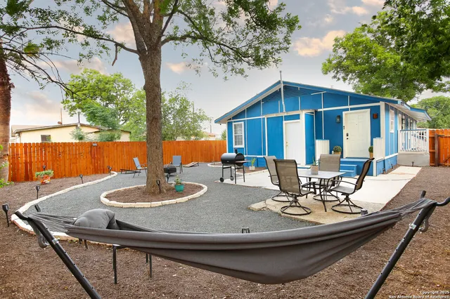 a view of a swimming pool with a lounge chairs