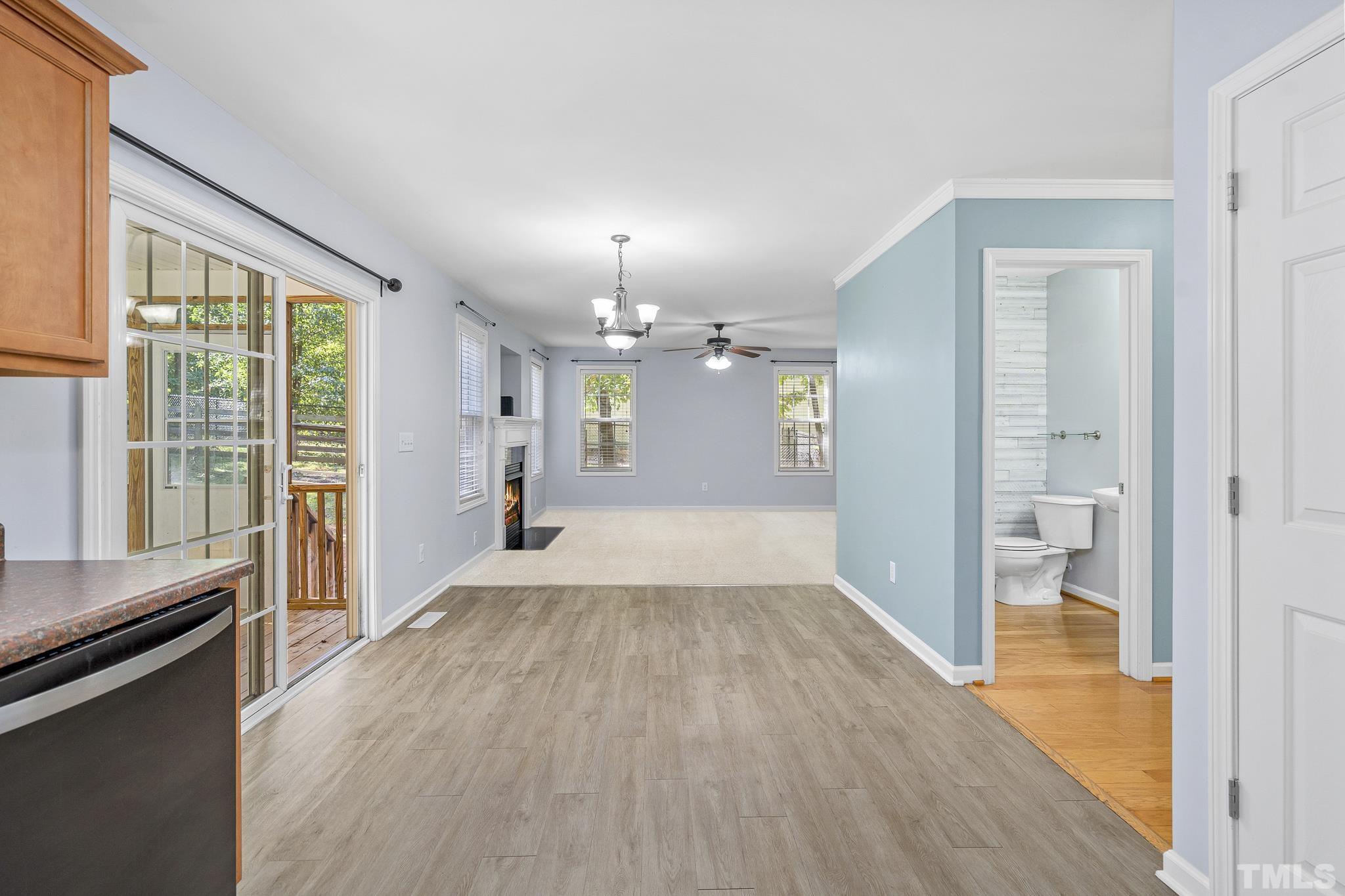 130 Broken Lance Drive Youngsville, NC 27596 - Photo 12 of 32 wooden floor in an empty room with a window
