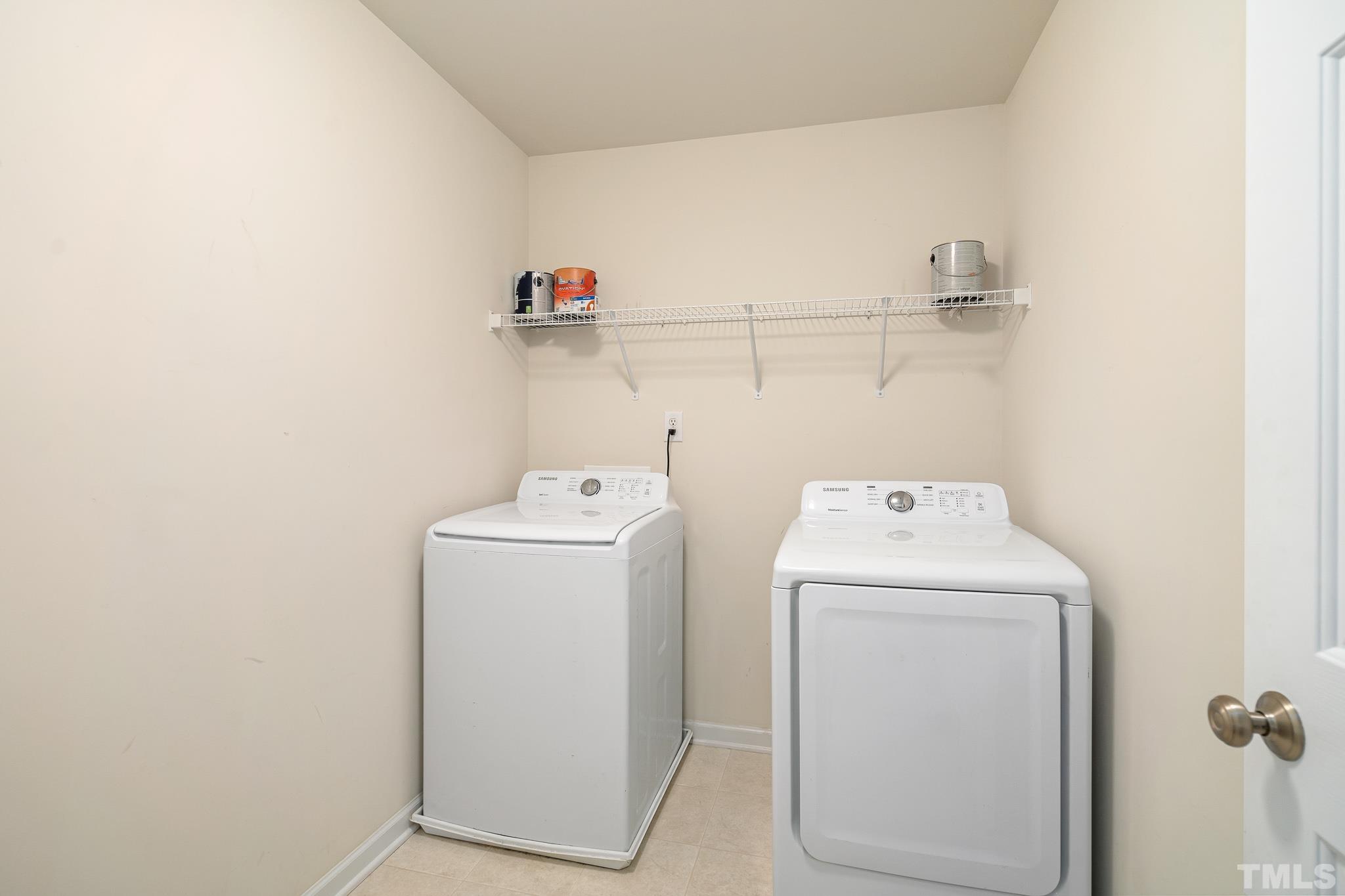 130 Broken Lance Drive Youngsville, NC 27596 - Photo 24 of 32 a utility room with dryer and washer