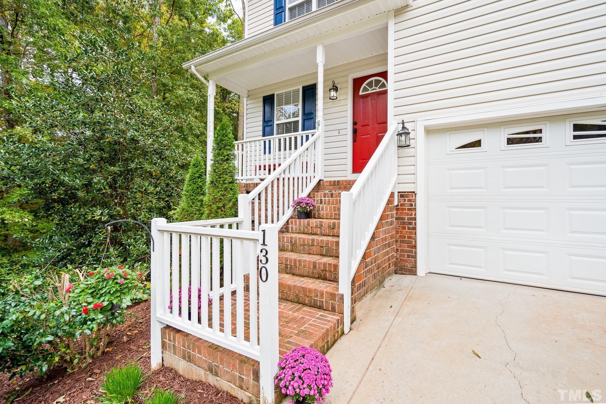 130 Broken Lance Drive Youngsville, NC 27596 - Photo 3 of 32 a view of wooden house with a small yard