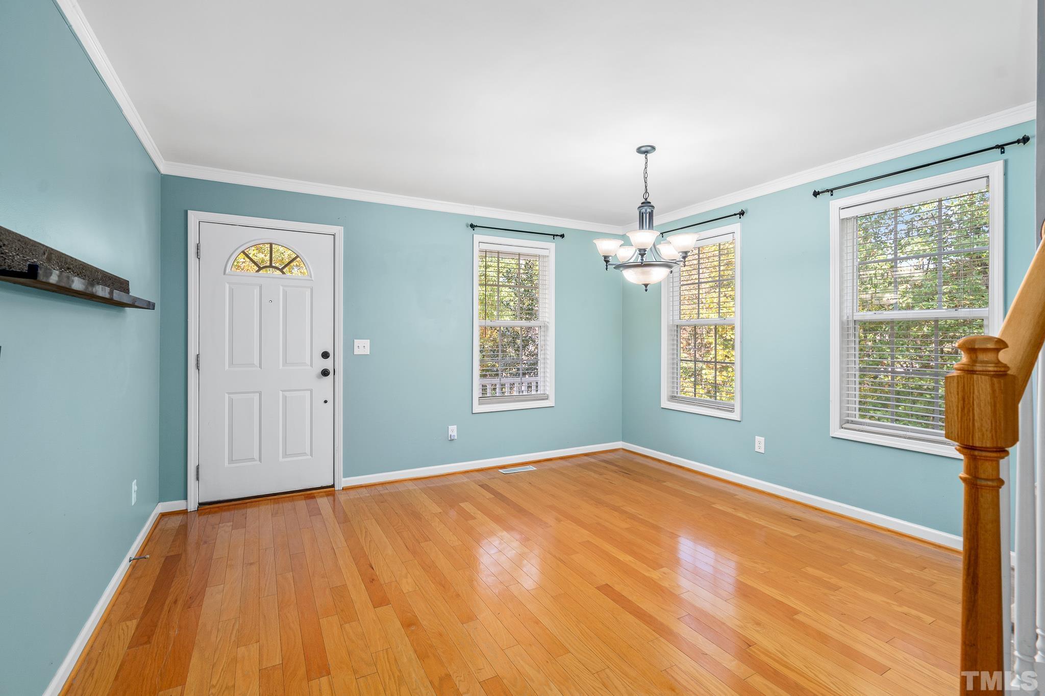 130 Broken Lance Drive Youngsville, NC 27596 - Photo 6 of 32 a bedroom with a bed and a window
