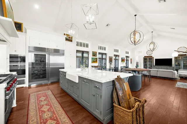 a large white tub sitting in front of a window