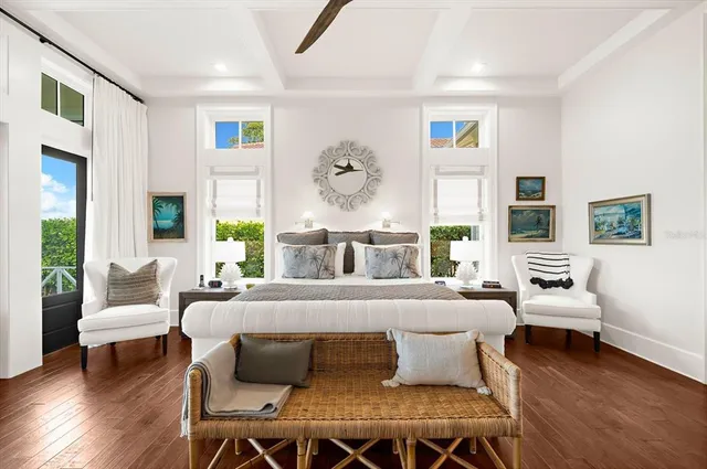 a living room with furniture a rug and a window