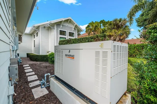a living room with furniture a flat screen tv and a window