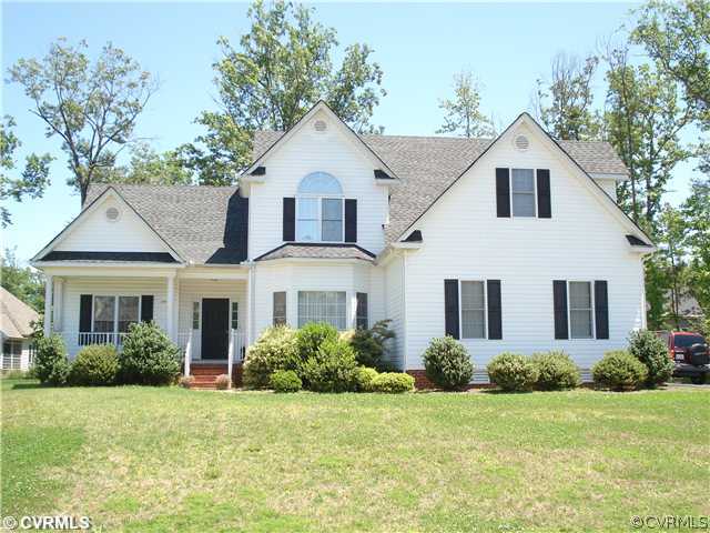 10907 Church Point Road Chesterfield, VA 23832 - Photo 1 of 7 a front view of a house with a yard