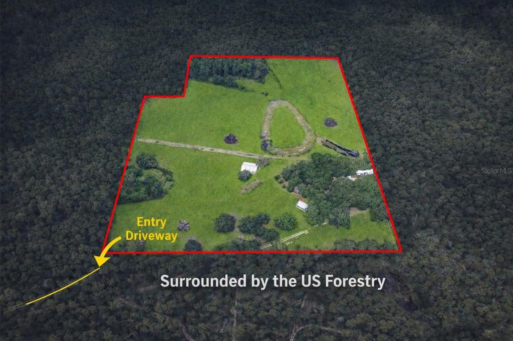 a sign that is sitting on a brick wall