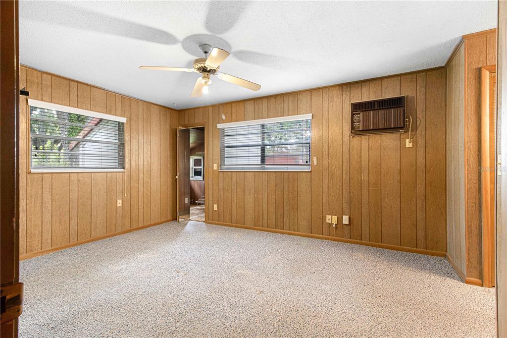 3350 Northeast 125th Terrace Road Silver Springs, FL 34488 - Photo 31 of 47 a view of an empty room with a window