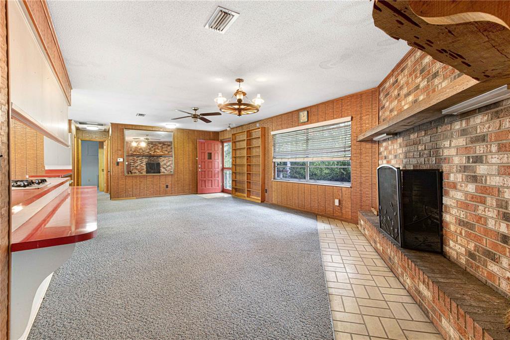 3350 Northeast 125th Terrace Road Silver Springs, FL 34488 - Photo 34 of 47 a view of livingroom with furniture and a fireplace