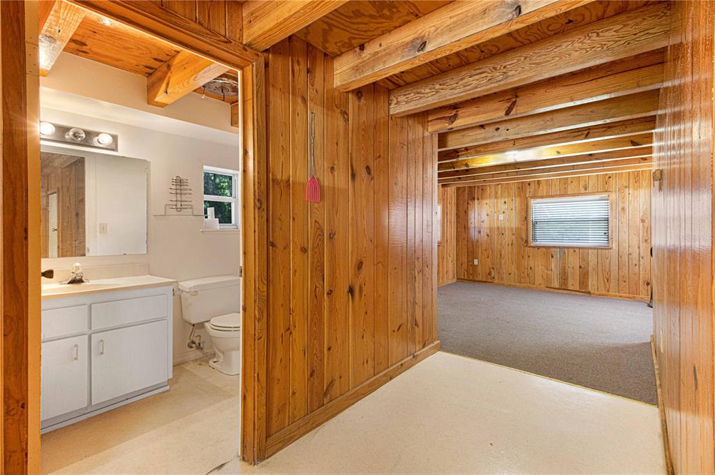 3350 Northeast 125th Terrace Road Silver Springs, FL 34488 - Photo 41 of 47 a view of a bathroom with mirror