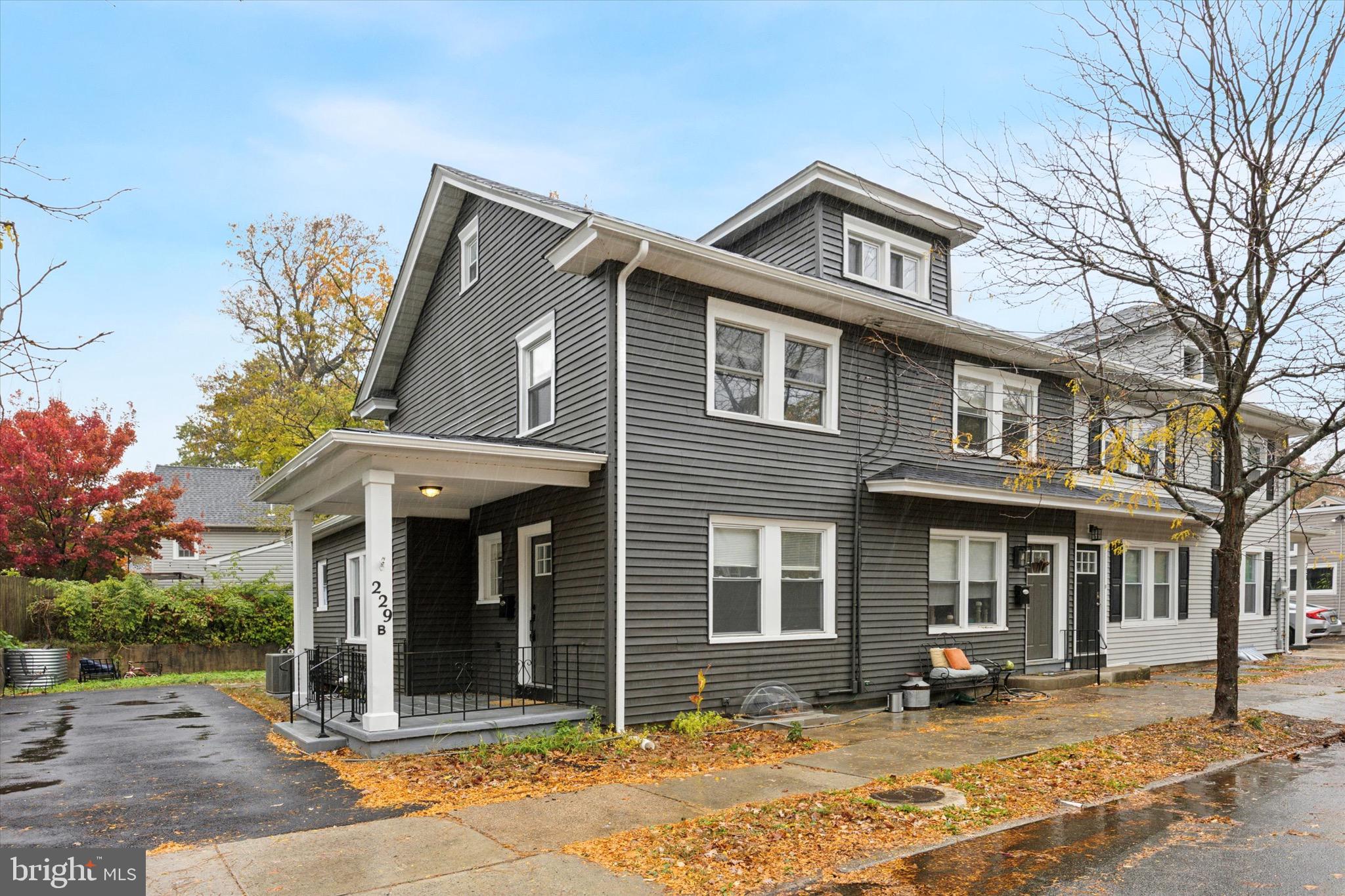 229 New Jersey Avenue, Unit B Collingswood, NJ 08108 - Photo 1 of 18 a front view of a house with a yard