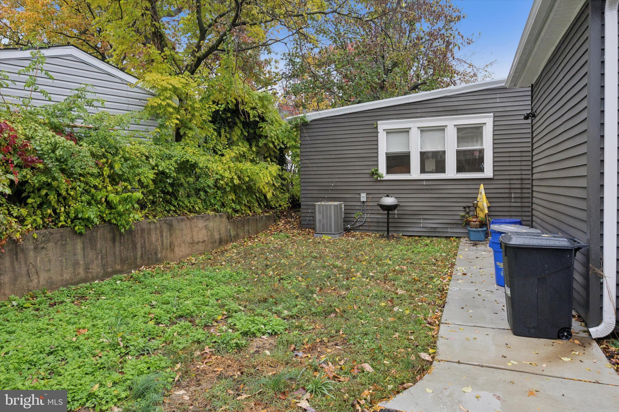 229 New Jersey Avenue, Unit B Collingswood, NJ 08108 - Photo 18 of 18 a front view of a house with garden