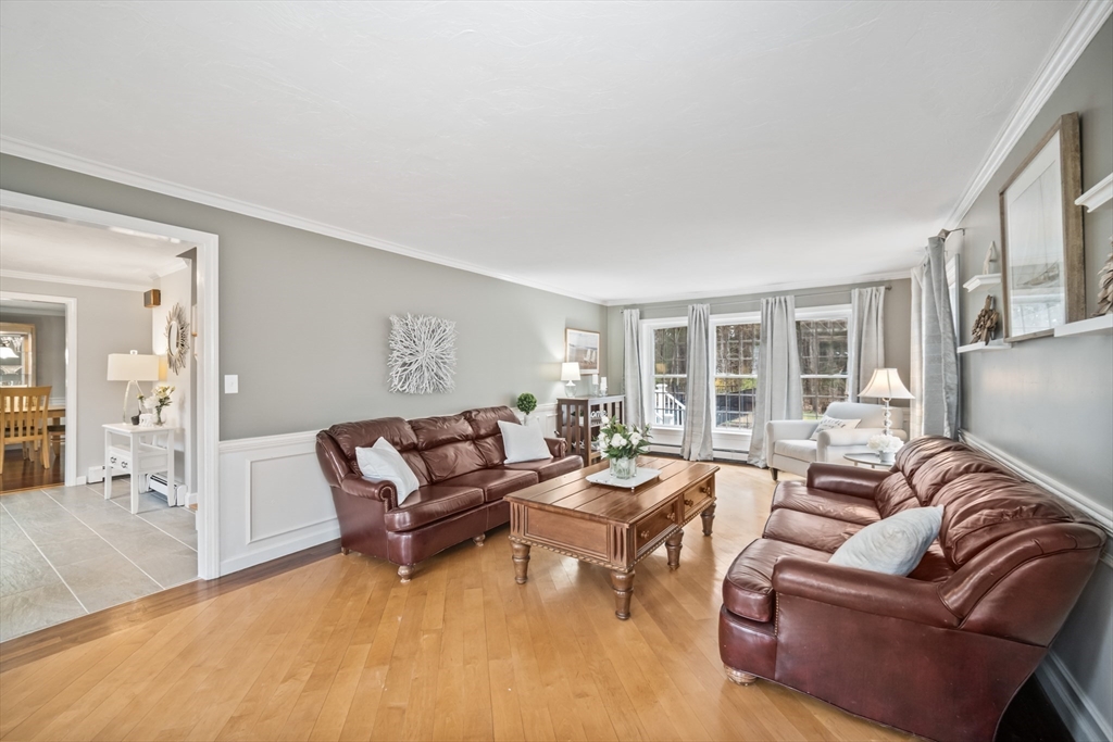 5 Strawberry Lane Norfolk, MA 02056 - Photo 18 of 42 a living room with furniture and a large window