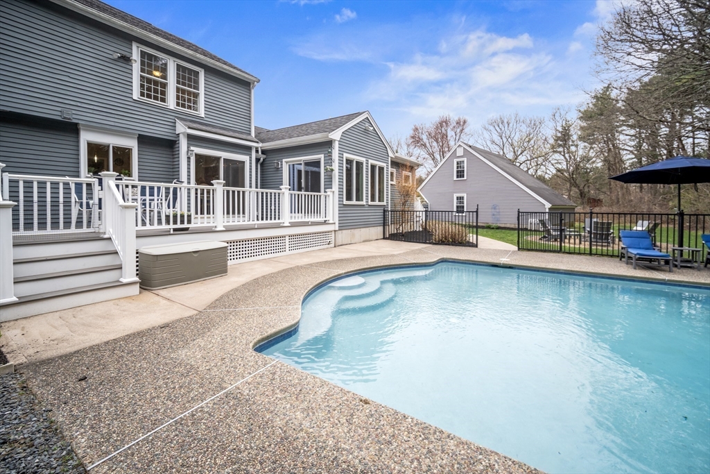 5 Strawberry Lane Norfolk, MA 02056 - Photo 31 of 42 a view of a house with pool and chairs