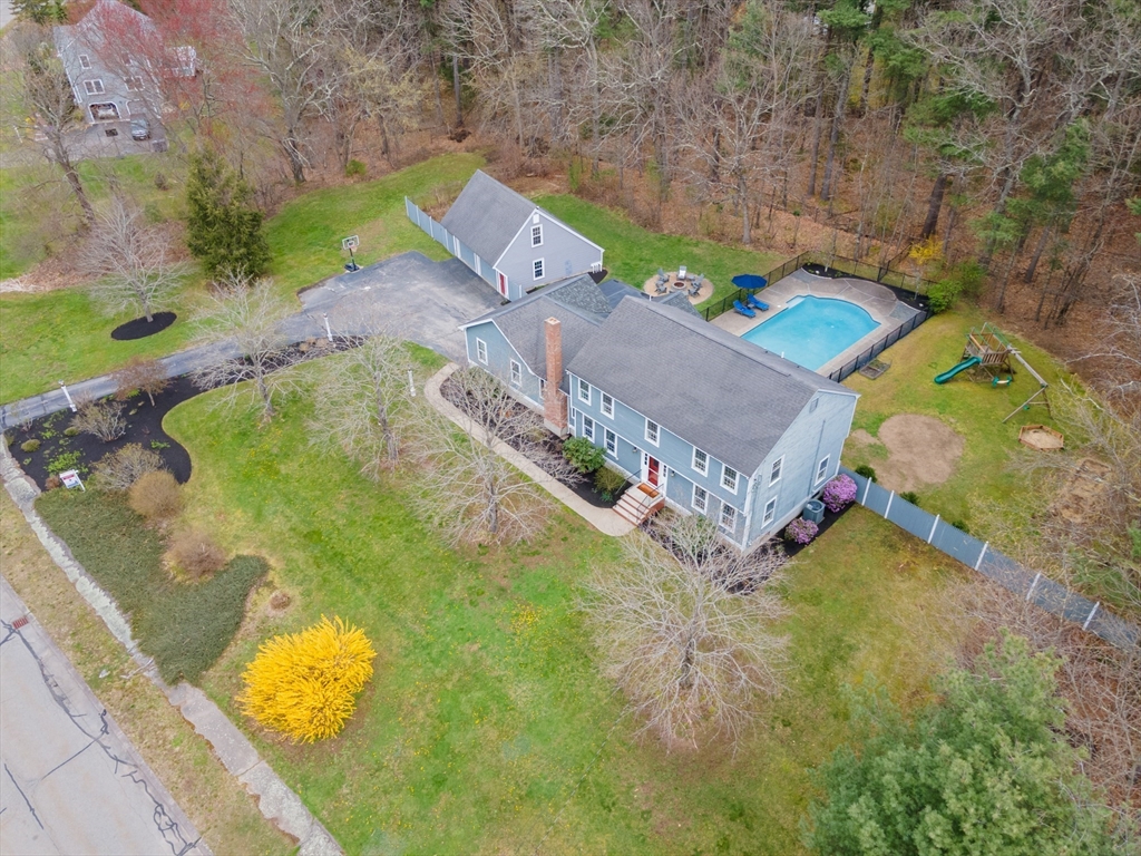 5 Strawberry Lane Norfolk, MA 02056 - Photo 38 of 42 an aerial view of a house with a swimming pool