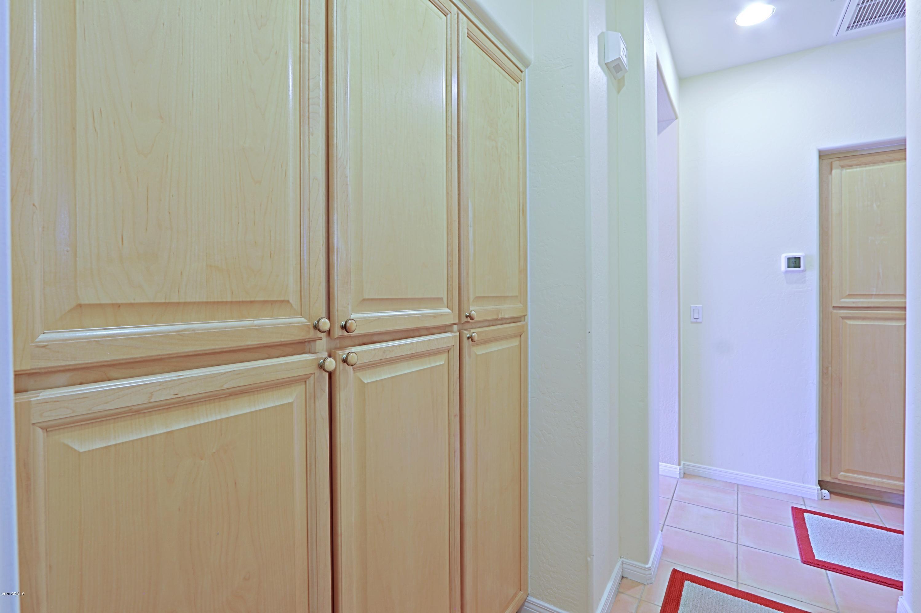 6803 East Eagle Feather Road Scottsdale, AZ 85266 - Photo 22 of 67 a bathroom with a glass shower door