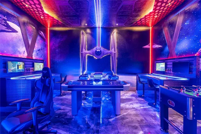 a bedroom with a bed and a painting on the wall